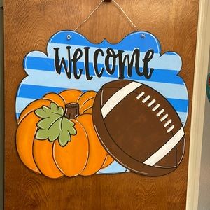 Fall door hanger